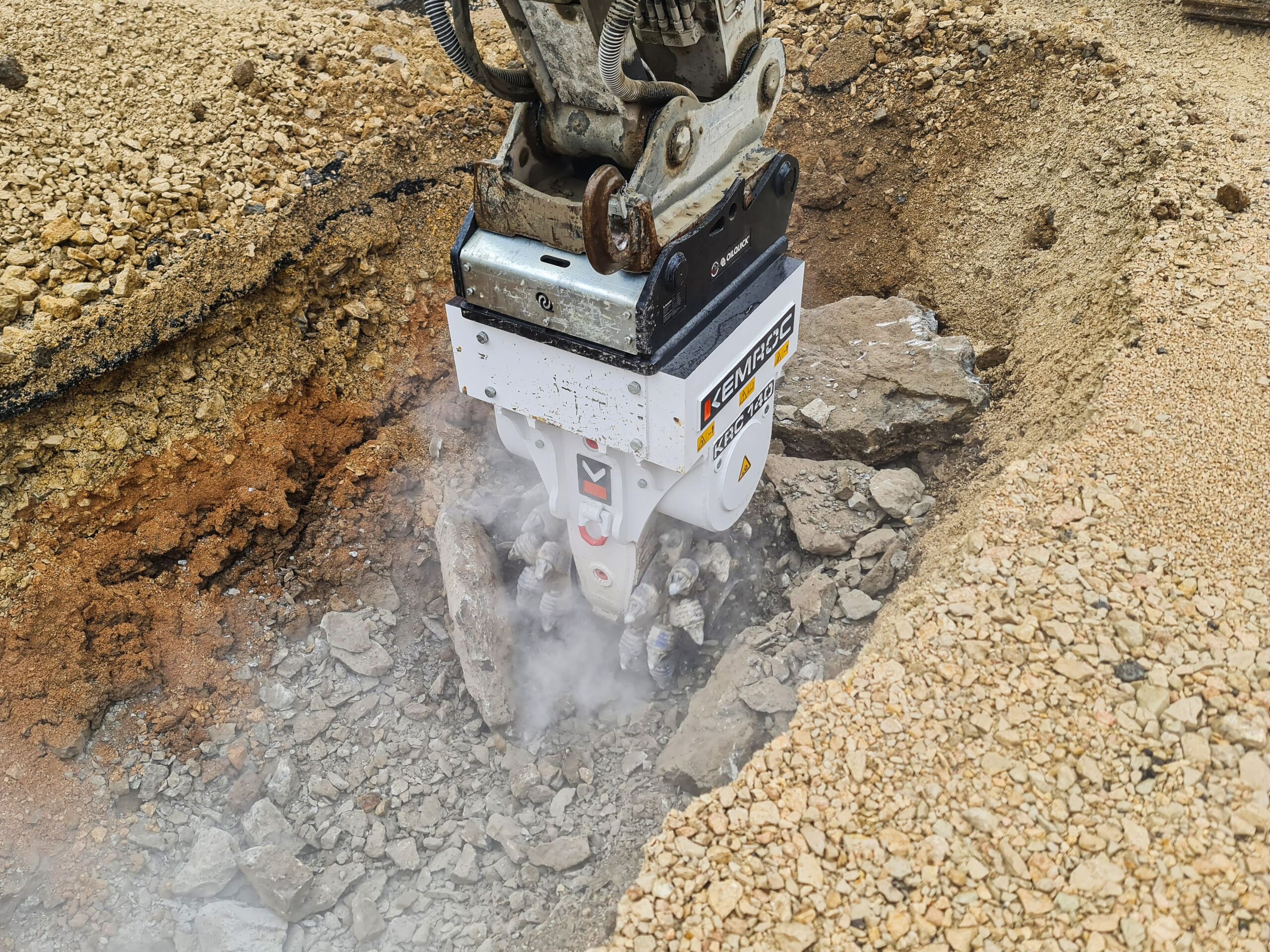 KRC Bullhead Cutter cutting narrow rock trench for pipeline installation