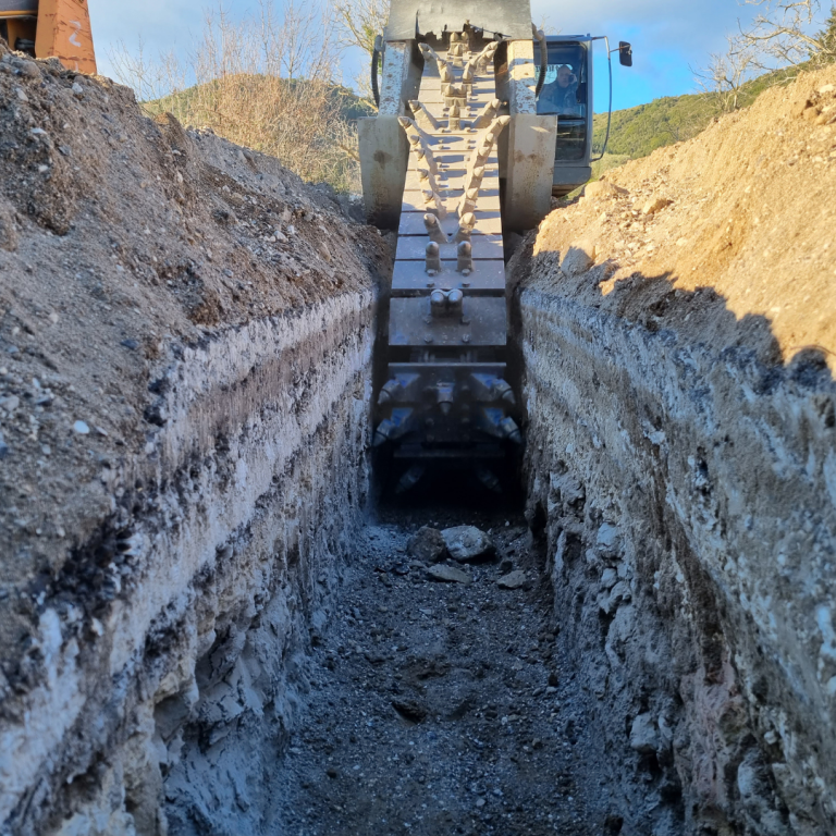 Narrow Trench made by KEMROC KTR Chain Trenchers