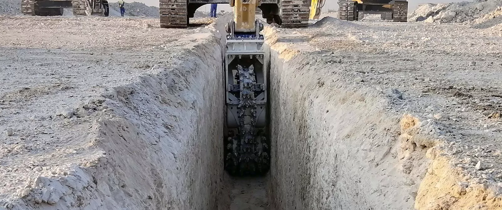 Trenching by Excavator attachment